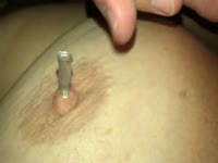 Bizarre bdsm fetish movie features bound wife having nipple penetrated by long needles